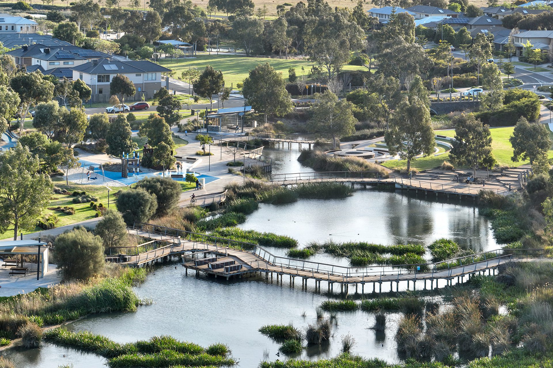 Svg+xml;charset=utf — tract Elevated view of saltwater coast wetlands, bay trail and community facilities