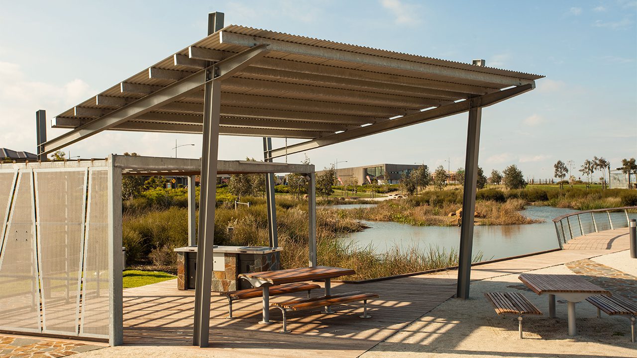 Svg+xml;charset=utf — tract Barbeque and picnic bench and chairs beneath a shelter by the water